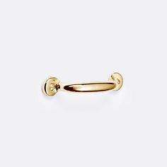 an open gold door handle on a white background