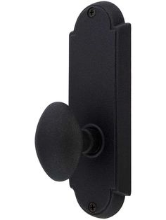 a black door handle with a round knob on the front and back side of it