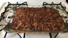 a casserole dish is sitting on top of the stove