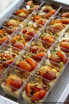 several trays filled with different types of food