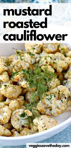 roasted cauliflower with herbs in a white bowl on a blue tablecloth and text overlay