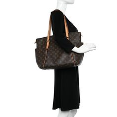 This is an authentic LOUIS VUITTON Monogram Totally MM. This tote is crafted of classic Louis Vuitton monogram-coated canvas. The bag features bucket pockets on either side, and vachetta cowhide leather trim and shoulder straps, with brass hardware. The top zipper opens the bag to a cocoa brown fabric interior with patch pockets. Cocoa Brown, Brown Fabric, Brass Hardware, Authentic Louis Vuitton, Cowhide Leather, Leather Trims, Louis Vuitton Monogram, Patch Pocket, Cocoa