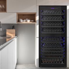 a wine cooler in the middle of a kitchen