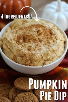 pumpkin pie dip in a white bowl surrounded by cookies