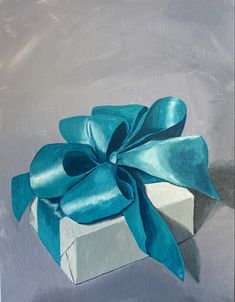 a painting of a white box with a blue bow