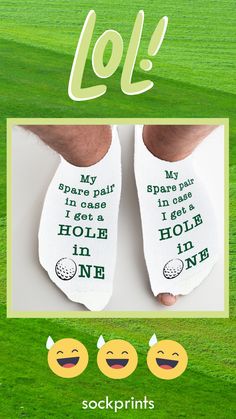 two socks with words on them that read lol, my upper pair i got a hole in one