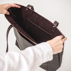 This handmade women tote bag is produced by Italian Soft leather. It has one pocket inside. The bag has a high-quality zipper that secures your belongings. It holds the shape perfectly and you may be confident that your things like cell phone, tablet, lap-top are safe. This bag is simple, reliable, and durable. Its universal look allows using the tote bag for various purposes. One may take the bag to the work, shopping, meeting, or walk and feel comfortable with it in any condition. SIZE: 〰️ SMA Everyday Leather Bags With Interior Card Slots, Everyday Brown Textured Leather Bag, Handmade Leather Shoulder Bag, Leather Work Bag, Lap Top, Handmade Tote, Tote Bags Handmade, Handbag Leather, Black Leather Tote