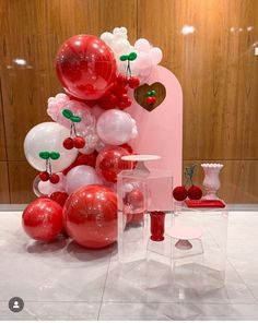 balloons, vases and other items are on display