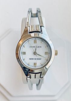 Anne Klein Silver Bracelet Watch  AR/1369 Stainless steel~ 28 mm~ Water resistant to 100 feet~ Fits up to 7.5" wrist~ New Battery~ Super Cute! Anne Klein Watch Silver, Silver Bracelet Watch, Women Wrist Watch, Wrist Watches, Anne Klein, Favorite Jewelry, Womens Watches, Bracelet Watch, Wrist Watch