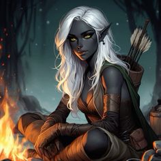 a woman with white hair and yellow eyes sitting on the ground next to a fire