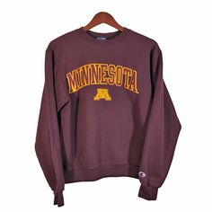 "UNIVERSITY Of MINNESOTA Burgundy Embroidered Sweatshirt Size S ITEM DESCRIPTION: Don't leave home with out this Sweatshirt, it will keep you warm! Material: 50% Cotton 50% Polyester APPROXIMATE MEASUREMENTS: Shoulder: 19.5\" Pit To Pit: 21\" Sleeves: 23\" Length: 23\" ITEM CONDITION: Excellent Pre Owned Condition. ABOUT THE UNIVERSITY OF MINNESOTA: The University of Minnesota, is a public research university in the Twin Cities of Minneapolis and Saint Paul, Minnesota. University of Minnesota fa Brown Crew Neck Top With Embroidered Logo, Brown Cotton Sweatshirt With Embroidered Logo, Brown Long Sleeve Sweatshirt With Embroidered Logo, Brown Cotton College Sweatshirt, Brown Crew Neck College Sweatshirt, Minnesota University, Minnesota Sweatshirt, Bike Boots, Frye Harness Boots