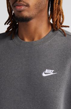 This crewneck sweatshirt cut from lightweight fleece is one you'll want in every color. 28" length (size Medium) Crewneck Long sleeve 80% cotton, 20% polyester Machine wash, tumble dry Imported Nike Relaxed Fit Crew Neck Sweats, Nike Cotton Sweatshirt With Ribbed Cuffs, Nike Crew Neck Sweats For Streetwear, Nike Casual Crew Sweatshirt, Nike Crew Neck Top With Embroidered Logo, Nike Cotton Crew Sweats, Nike Crew Neck T-shirt For Fall, Basic Fleece Crew Sweatshirt, Nike Crew Neck Sweats For Fall