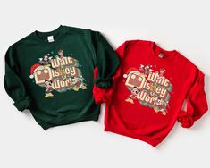 Disney Letter Print Sweatshirt For Winter, Holiday Disney Crew Neck Tops, Disney Graphic Print Top For Winter, Disney Graphic Print Tops For Winter, Disney Christmas Cotton Top, Disney Cotton Christmas Tops, Graphic Print Tops For Disney Fan Events In Winter, Disney Cotton T-shirt For Winter, Disney Holiday Tops For Winter