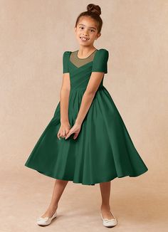 Anirra is our adorable flower girl dress cut from matte satin and tulle. She features a scoop neckline pleated bodice paired with puff sleeves. The look is complete with an tea length ball gown skirt and large bow. Dark Green Ball Gown, Peacock Flower Girl Dress, Satin Flower Girl Dresses, Tea Length Flower Girl Dress, Green Ball Gown, Flower Girl Dresses Blue, Satin Flower Girl Dress, Blue Ball Gowns, Gown Skirt