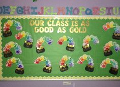 a bulletin board with handprinted turkeys on it and words that read our class is as good as gold