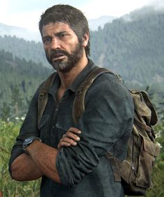 a man with a beard and backpack standing in front of some trees, bushes and mountains