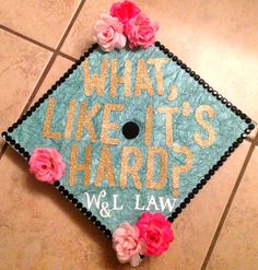 a decorated cap that says, what's like it's hard? w & l law