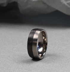 a wedding band that has been made to look like it is in the middle of a bed