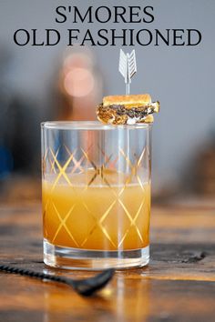 This S'mores cocktail is a great Old Fashioned. Make with infused mezcal and aged rum, this sweet and decadent drink is a must make with chocolate bitters! #cocktail #rum Smores Old Fashioned Cocktail, Cocoa Bitters Cocktail, Chocolate Old Fashioned Cocktail, Chocolate Bitters Cocktail, Warm Winter Cocktails, Whiskey Cocktails Easy, Chocolate Bitters, Cocktails Easy, Cocktail Hour Decor