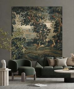 a living room filled with furniture and a painting on the wall