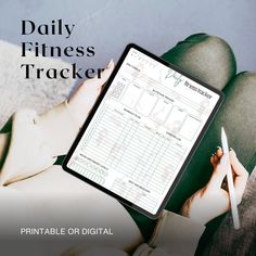 a person holding a tablet with a daily fitness tracker on the screen next to them