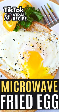 a close up of a plate of food with an egg on it and the words microwave fried eggs