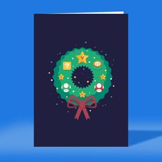 a christmas card with a green wreath and stars on it, against a blue background