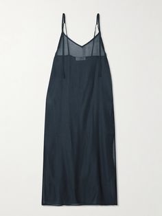 '90s-esque sheer slip dresses, like The Frankie Shop's 'Madeline' style, are seriously back on our wishlists. It’s cut from near-weightless voile with a V-neckline and flowing ties along the front and back. Style it over a slip or a bandeau and high-waisted briefs. Chic Sheer Slip Dress With Spaghetti Straps, Chic Sheer Spaghetti Strap Slip Dress, Sheer V-neck Slip Dress For Summer, Sheer Sleeveless Summer Slip Dress, Sheer Sleeveless Slip Dress For Summer, Sheer Sleeveless Slip Dress For Beach, Sheer Slip Dress For Summer, Summer Sheer Slip Dress With Spaghetti Straps, Sheer Slip Dress With Spaghetti Straps For Summer