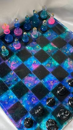 a glass chess board with blue and purple tiles