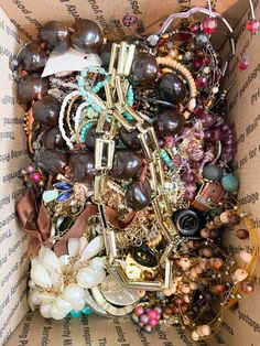 This is a lot of broken salvaged junk jewelry. Of course everybody has a different definition of junk. This is best  for crafting or repurposing. I  used to sell jewelry and now I have moved on to clothing so I am getting rid of many boxes from my stash! This has not been sorted through and you could definitely find some treasures in here!! The styles range from vintage to modern. You will find broken pieces in here and you will also find some wearable pieces.  You can also expect to find tangled and tarnished jewelry in these boxes. That is Half the fun of the treasure hunt ! You never know what's in the center of the knot until you get there !  You can find the following in these boxes : Brooches  Necklaces  Bracelets  Pendants  Rings Watches  Loose beads / gems  These boxes are sold as- Solar System Bracelet, Sell Jewelry, 70’s Style, Vintage Slip Dress, Junk Jewelry, Broken Pieces, Tarnished Jewelry, Vintage Slips, Brooch Necklace