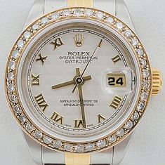 Ladies Rolex 26mm DateJust 18K Gold Two Tone Watch with Roman Numerals with Off-White Dial and Diamond Bezel. Pre-Owned SN# J66**** Brand: Rolex. Crystal: Sapphire. Gender: Women's. Bezel: Diamond Bezel. Dial Color: Off-White. Condition: Very Good. Case Dimensions: 26mm. Movement: Self-Winding (Automatic). Metal Type: Stainless Steel / 18K Yellow Gold. Bracelet / Strap: Jubilee 18K Gold / Stainless Steel. Box / Certificate: Rolex Box / Certificate of Authenticity. Service Warranty: One (1) Year Elegant White Diamond Watch With Date Display, White Luxury Diamond Watch With Date Display, Luxury White Diamond Watch With Date Display, White Diamond Watch With Date Display For Anniversary, Elegant Anniversary Jewelry And Watches With Date Display, White Diamond Watch With Date Indicator For Formal Occasions, Anniversary White Jewelry And Watches With Diamond Hour Markers, Timeless White Jewelry And Watches For Anniversary, Luxury White Jewelry And Watches For Anniversary