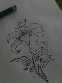 a pencil drawing of a flower on paper