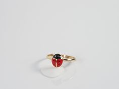 Pretty little ladybug ring in 18 carat gold plated and 3 microns thick (very good quality), very small size from 40 to 46. Size 1 (Europe) = 41 (France / Germany) = 1 3/4 (USA) = 13.1 mm in diameter. Size 2 (Europe) = 42 (France / Germany) = 2 (USA) = D (UK) = 13.4 mm in diameter. Size 3 (Europe) = 43 (France / Germany) = 2 1/2 (USA) = E (UK) = 13.7 mm in diameter. Size 4 (Europe) = 44 (France / Germany) = 4 (USA) = F (UK) = diameter 14mm. Size 5 (Europe) = 45 (France / Germany) = 3 1/3 (USA) G 14k Yellow Gold Enamel Ring Gift, Yellow Gold Oval Enamel Ring For Gift, Oval Yellow Gold Enamel Ring For Gift, Dainty Gold Enamel Ring Gift, Gold Plated Yellow Gold Midi Rings As Gift, Oval Yellow Gold Midi Rings As Gift, Handmade Yellow Gold Enamel Ring Gift, Yellow Gold Midi Rings For Gift, Adjustable Yellow Gold Enamel Ring Gift