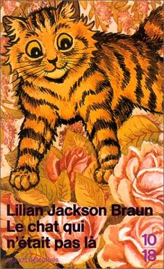 a book with an image of a cat and flowers on the cover, in french