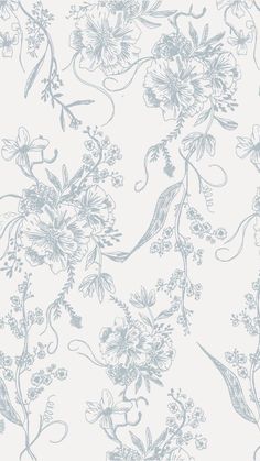 a blue and white floral wallpaper with flowers on the side, as well as vines