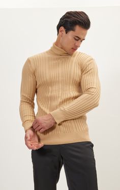 DETAILS Elevate your style with the clean and sophisticated Roll Neck Ribbed Knit Sweater. Crafted with precision, this sweater is a versatile addition to your wardrobe, blending contemporary design with timeless comfort.Features:1. Finely Textured Ribbed Blend: The sweater is made with a finely textured ribbed cotton-acrylic blend, ensuring both a luxurious feel and a modern, visually appealing texture.2. Cozy Roll Neck: The close-fitting, cozy roll neck is a key feature of this sweater, provid Men Closet, Camel Sweaters, Ribbed Knit Sweater, Roll Neck, Ribbed Sweater, Modern Man, Jeans Denim, Blending, Knit Sweater