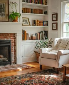 a living room filled with furniture and a fire place in front of a book shelf