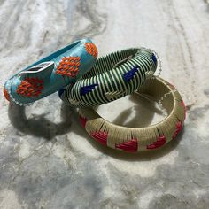 Set Of Three Bangle Bracelets From Anthropology. They Run Small, So For Smaller Hands And Wrists. Originally $38 Each. Nwt Multicolor Friendship Bracelets For Spring, Handmade Blue Friendship Bracelets For Spring, Multicolor Bangle Jewelry For Spring, Spring Bangle Beaded Bracelets, Nail Bangle, Statement Cuff Bracelet, Pearl Charm Bracelet, Lava Rock Bracelet, Faux Pearl Bracelet