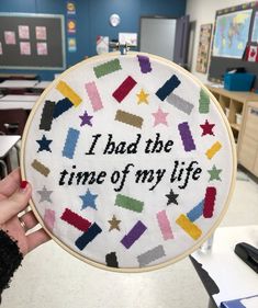 someone holding up a cross - stitch hoop with the words i had the time of my life