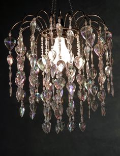 a crystal chandelier hanging from a ceiling