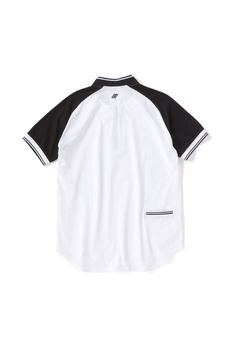 a white and black shirt with two contrasting sides on the chest, one side has an open