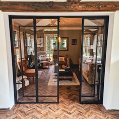 the inside of a house with glass doors