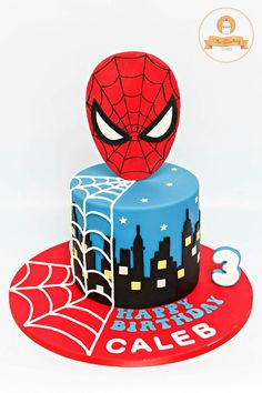 a spiderman birthday cake with the number 3 on it