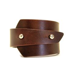 Unisex handcrafted leather bracelet, made from high quality genuine Italian leather. Bracelet has a unique asymmetrical shape, closes with two metal button head studs. Bracelet width in the widest place is 5 cm, leather thickness is about 3,5 mm. This genuine leather is very high quality, can be worn for many years. Comes in our branded box, perfect for a gift. - SIZE GUIDE - In order to choose the right size measaure the circumference of your wrist. Choose the corresponding bracelet size accord Bracelet Wide, Bracelet Man, Man Bracelet, Leather Wristband, Leather Ideas, Leather Wristbands, Bracelet Mens, Wide Bracelet, Bracelet Men