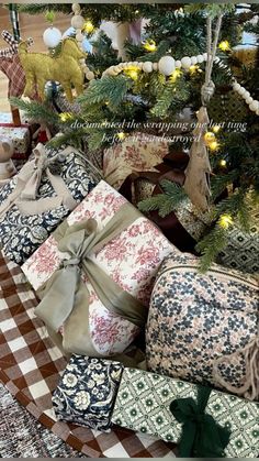 several wrapped presents under a christmas tree