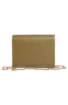 A pivoting monogram clasp adds heritage polish to this envelope wallet made from calfskin leather embossed to mimic the texture of grain de poudre. A removable chain strap gives you the option to carry it as an elegant evening bag. Turnlock closure Removable chain shoulder strap Interior wall pocket; three card slots Leather lining Leather Made in Italy Designer Handbags Everyday Rectangular Wallet On Chain With Gold-tone Logo, Luxury Rectangular Wallet On Chain With Gold-tone Logo, Classic Wallet On Chain With Gold-tone Logo Plaque, Classic Formal Wallet On Chain With Magnetic Closure, Chic Wallet On Chain With Gold-tone Logo For Everyday, Elegant Everyday Wallets With Gold-tone Logo Plaque, Classic Formal Wallet With Chain Strap, Elegant Formal Wallet On Chain With Magnetic Closure, Classic Gold Wallet On Chain For Formal Events