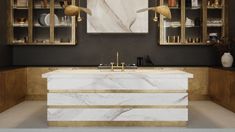 a kitchen with marble counter tops and gold accents