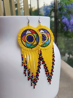 Kelis Africa Presents Kenyan Earrings, Intricately Handwoven Kenyan Massai Earrings.  A great addition to any earring lovers collection. The earrings are created from seed beads carefully woven together with wire threads. Making them the perfect accessories to make you stand out.  There are variety of colours for each season enabling you to wear them at anything of the year and for various occasions.  There are the perfect gift for that outstanding lady. 14cm Long Accessories To Make, Earrings Minimalist, Zulu, Minimalist Earrings, Beaded Earrings, Seed Beads, Etsy Earrings, Dangle Drop Earrings, Hand Weaving