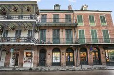 an old brick building with many balconies