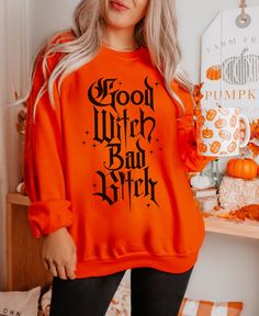 Spooky Season is here! Our Good Witch Bad Btch sweatshirt is the perfect addition to your fall wardrobe. Whether you're a good witch or a bad witch, you'll want to be part of this Halloween girls club. Grab your pumpkin spice latte and hit the pumpkin patch or haunted house in this cute and cozy Halloween Sweatshirt. Good Witch Bad Btch Sweatshirt, Halloween Shirt, Women's Trendy Halloween Sweatshirt, Funny Halloween shirt, Halloween gifts for women A sturdy and warm sweatshirt bound to keep you Spooky Oversized Halloween Sweatshirt, Oversized Spooky Halloween Sweatshirt, Long Sleeve Halloween Top, Witchy Long Sleeve Sweatshirt For Fall, Halloween Letter Print Long Sleeve Sweatshirt, Witchy Letter Print T-shirt For Fall, Orange Crew Neck Halloween Sweatshirt, Fall Witchy Crew Neck T-shirt, Witchy Crew Neck T-shirt For Fall